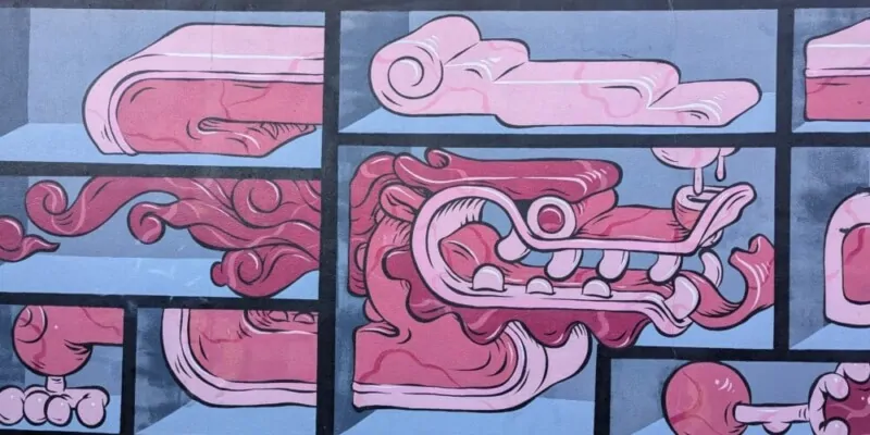 Un street art à Wellington représentant un dragon rose dans un style pop vibrant. L'œuvre colorée apporte une touche dynamique à l'architecture urbaine de la ville